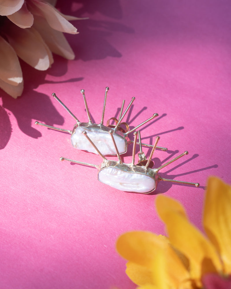 Handmade pearl spiky statement studs with bold design.