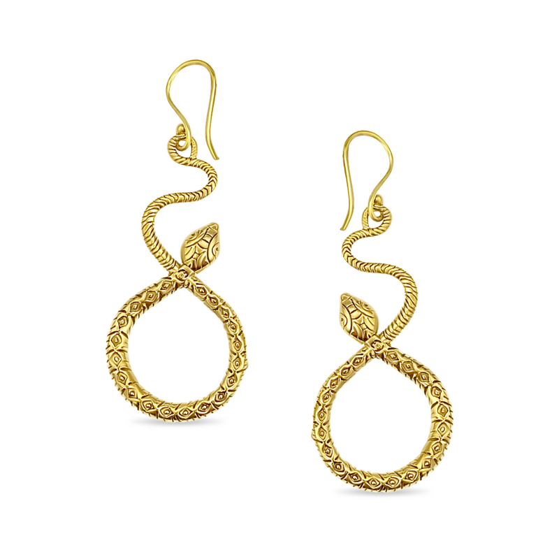 Close-up of gold snake dangle earrings with embossed texture, showcasing handcrafted detailing and artistic serpent-inspired elegance.