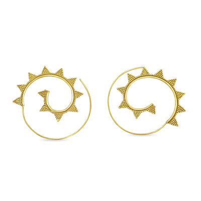 Gold spiral earrings with spiked geometric design displayed on white background, featuring handcrafted symmetry and bold artistic style.