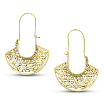Angled view of Flower Of Life Gold Metal Drop Earrings highlighting detailed geometry.