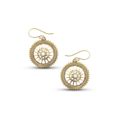 Angled view of small gold chakra center hook earrings with sparkling white crystal centerpiece.
