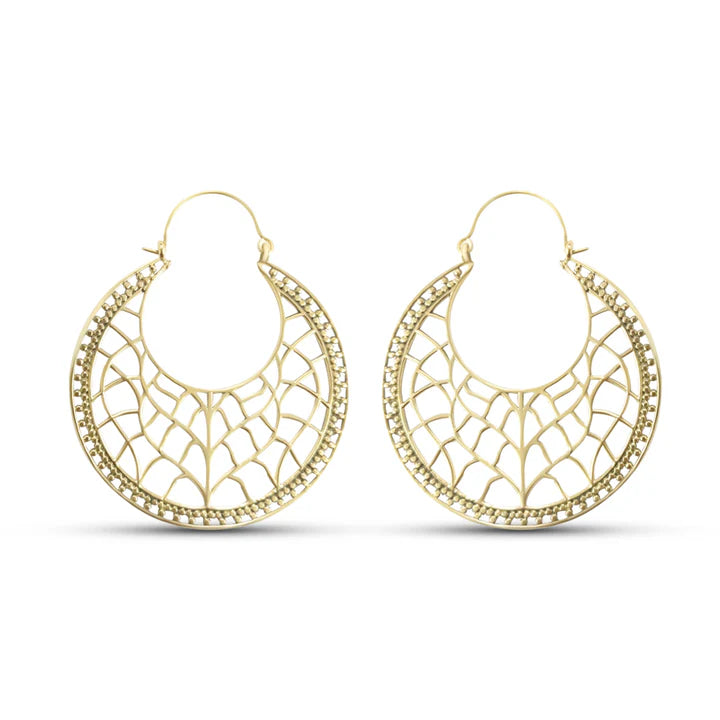 Front view of big gold jali drop hoop earrings with intricate openwork design.
