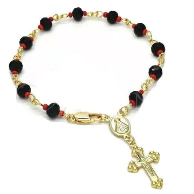 Side angle of gold cross rosary bracelet featuring red and black evil eye beads.
