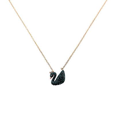 A rose gold chain necklace with a black swan pendant, displayed on a white background.