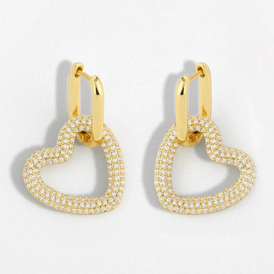 Close-up of Gold Heart Hoops with sparkling cubic zirconia diamonds.