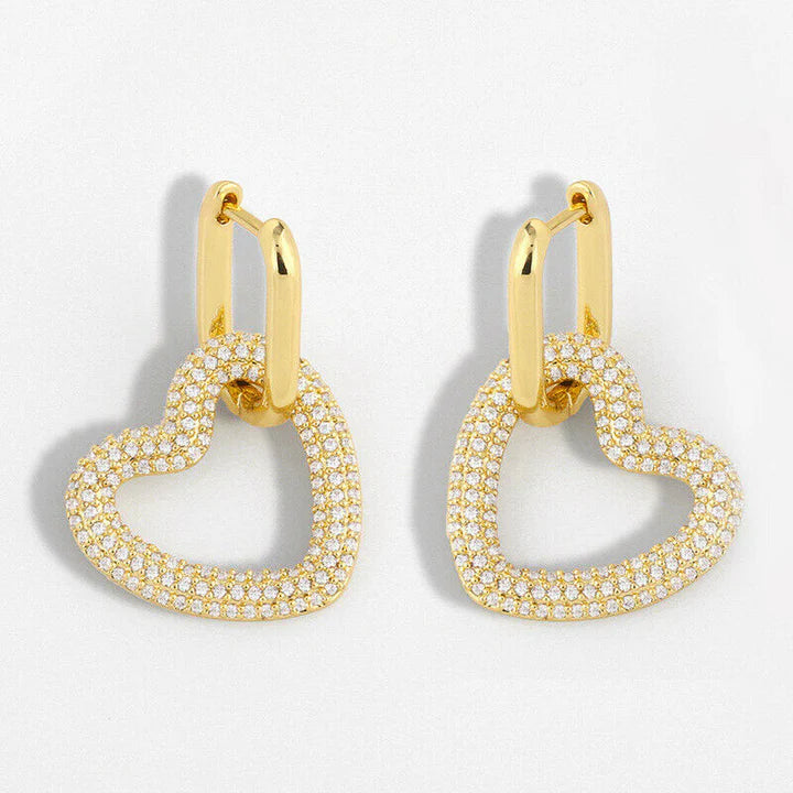 Close-up of Gold Heart Hoops with sparkling cubic zirconia diamonds.