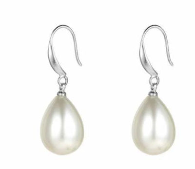 Close-up of polished pearl drop earrings in silver finish.