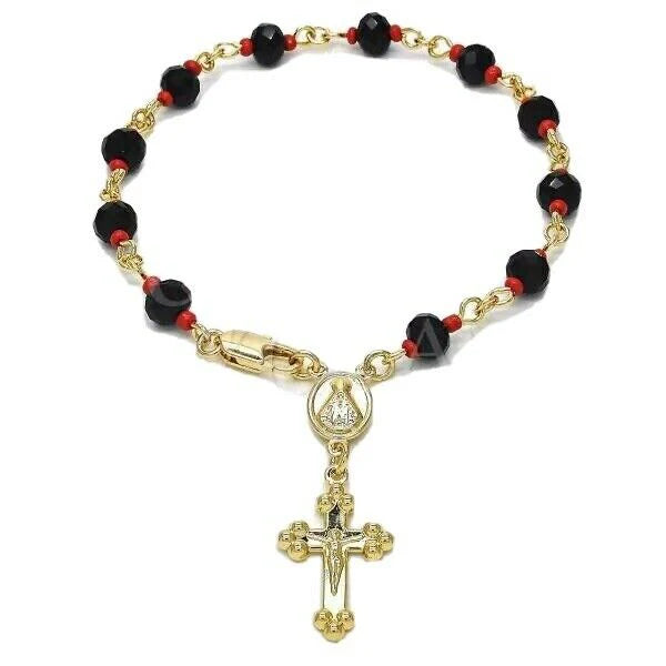 Top view of Evil Eye Cross Rosary Bracelet arranged in circular pattern.