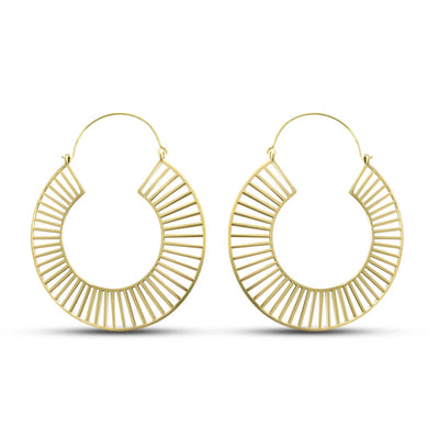 Front view of extra large gold tracks statement hoop earrings with geometric cut design.