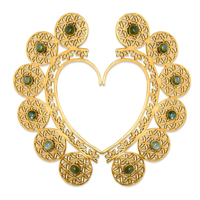 Gold and gemstone ear cuff set with intricate heart-shaped open design, featuring detailed filigree and gemstone accents.