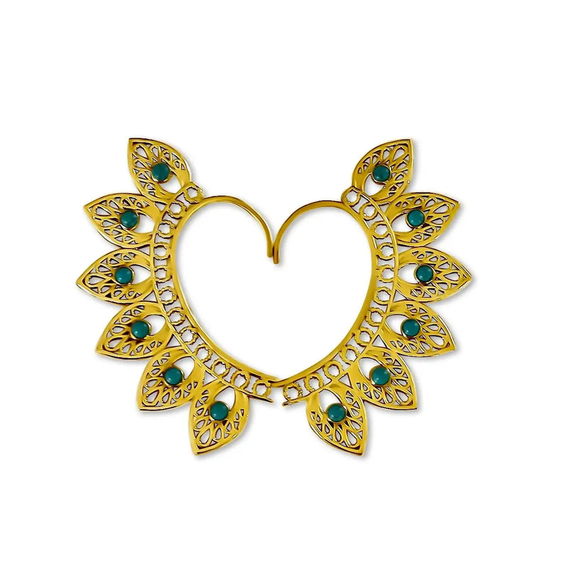 Gold ear cuff set in heart shape with turquoise gemstones and intricate detailing.