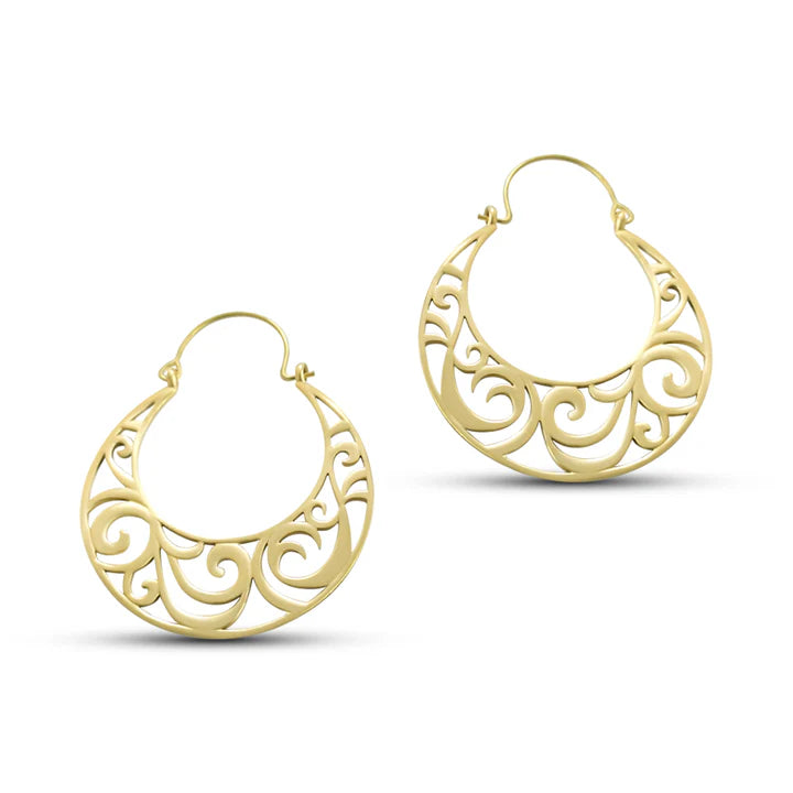 Gold and silver vintage curvy boho hoop earrings captured from side angle.