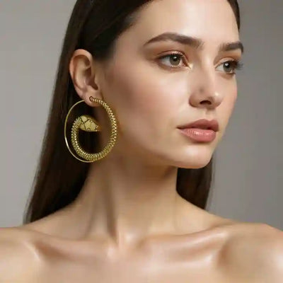 Model wearing gold snake threader earrings, 1.5-inch minimalist drop design.