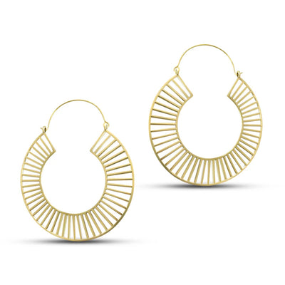 Detailed close-up of gold tracks large statement hoop earrings with fine handcrafted finish.