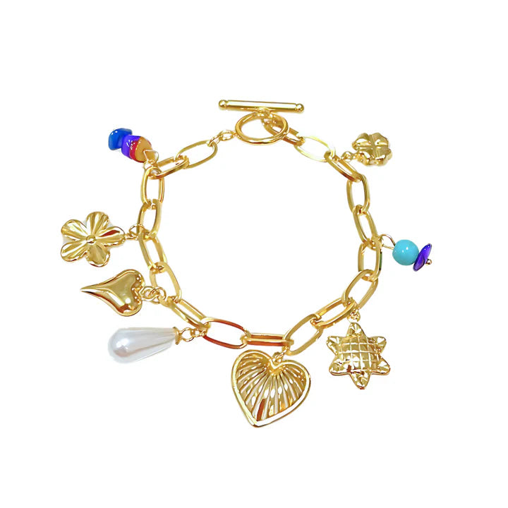 Golden charm link bracelet featuring heart, clover, star, and pearl charms, elegant handcrafted jewelry.
