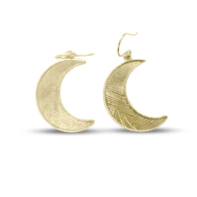 Golden crescent moon earrings with engraved detailing, celestial boho-style jewelry.
