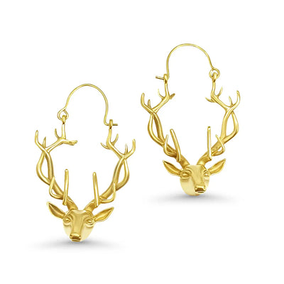 Pair of golden deer antler earrings displayed on white background, bold and elegant accessory.