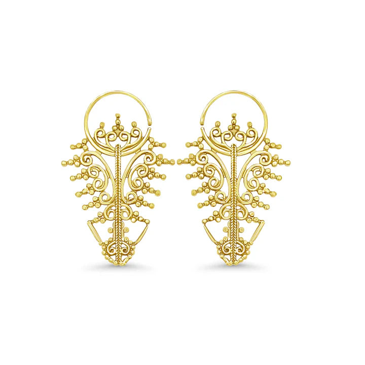 Pair of golden filigree leaf earrings displayed on plain white surface, traditional artisan style.