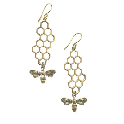 Pair of golden honeybee and honeycomb drop earrings displayed on white background, elegant accessory.