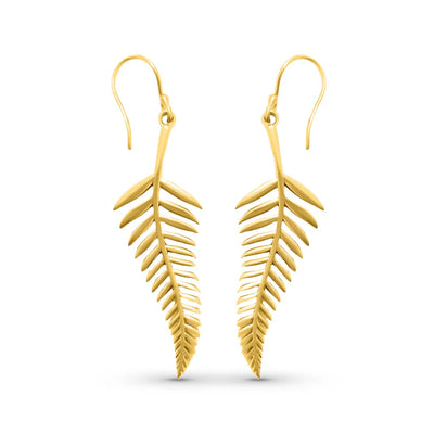 Minimal display of gold palm leaf drop earrings, modern botanical design.