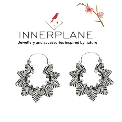 Innerplane brand banner displaying Evergreen Creole Leaf gold and silver hoop earrings.