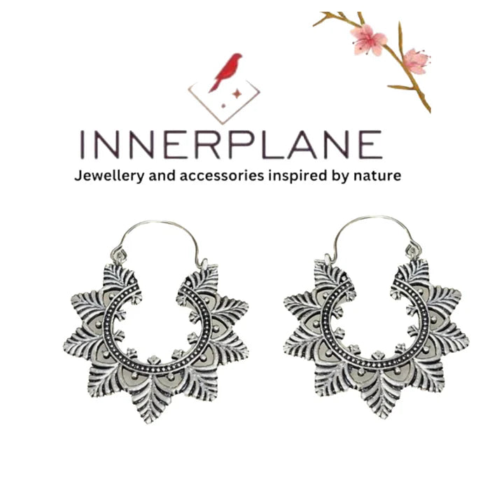 Innerplane brand banner displaying Evergreen Creole Leaf gold and silver hoop earrings.