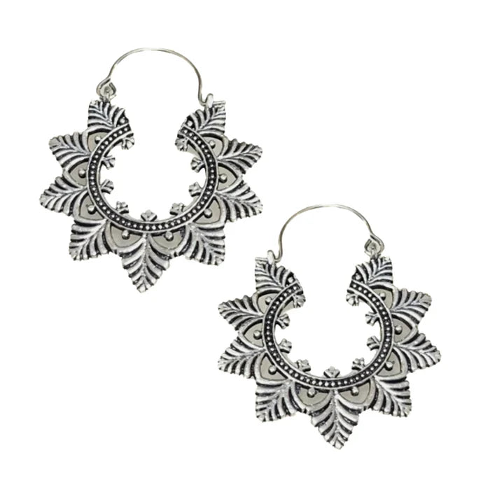 Pair of silver Evergreen Creole Leaf hoop earrings photographed from a side view.