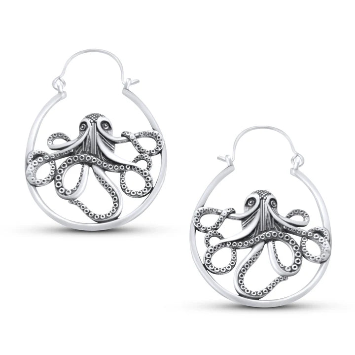 Pair of silver Kraken ocean drop earrings photographed from side angle on white background.