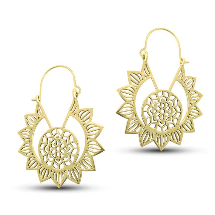 Pair of tribal flower openwork gold plated hoop earrings showing handcrafted circular design.