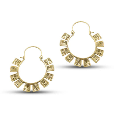 Pair of Tribal Square gold metal hoop earrings displayed from an angle showing intricate pattern.