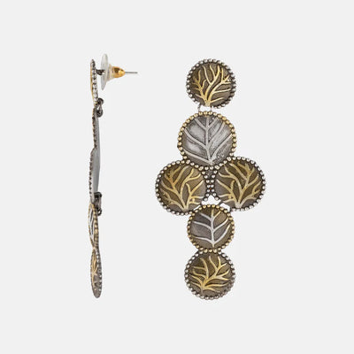 Side profile of Two Tone Leaf Drop Earrings showing metal texture and curve.