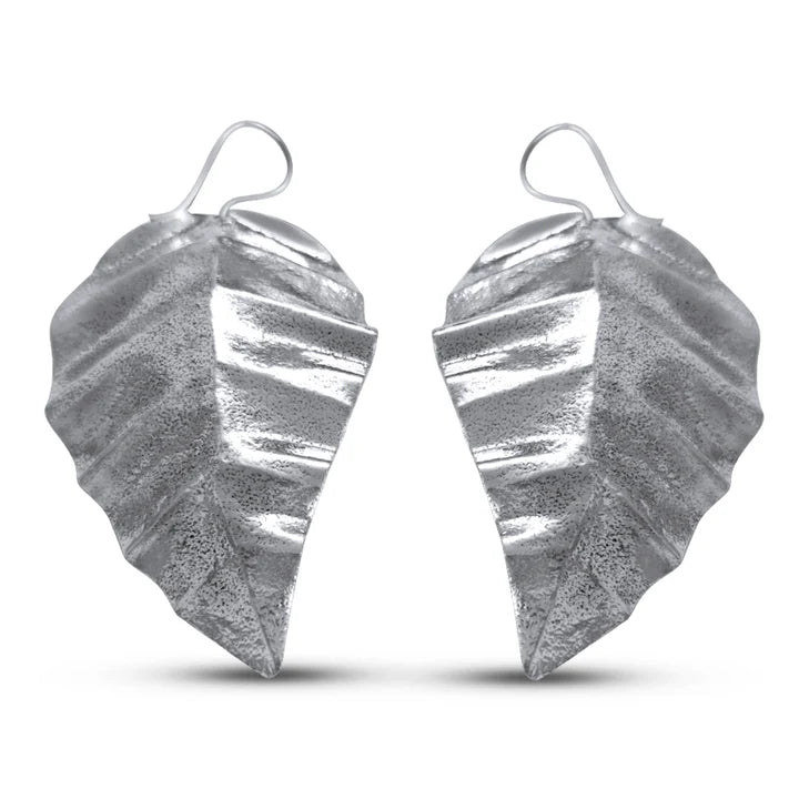 Front view of silver guava leaf drop earrings with textured detailing and organic leaf shape.