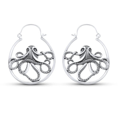 Close-up of single gold Kraken ocean octopus earring highlighting intricate metal texture.
