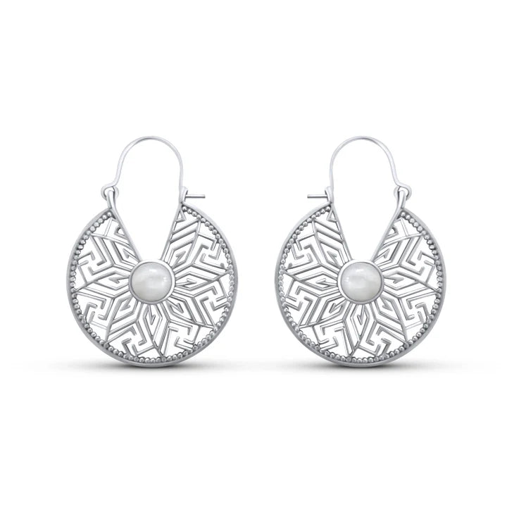 Front view of sterling silver mandala flower hoop earrings with white cat eye stone centerpiece.