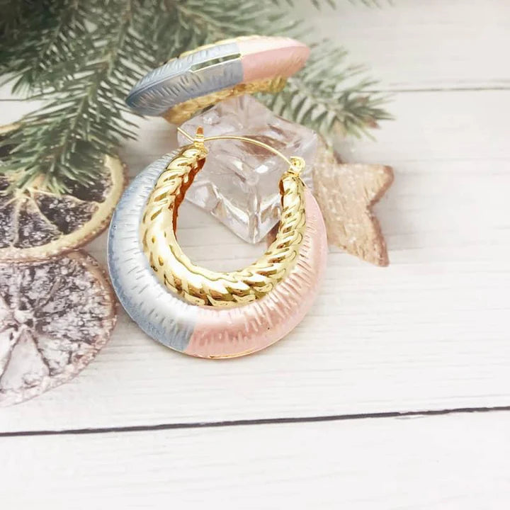 Close-up of Tricolor Basket Hoop Earrings showing gold, silver, and rose tones.