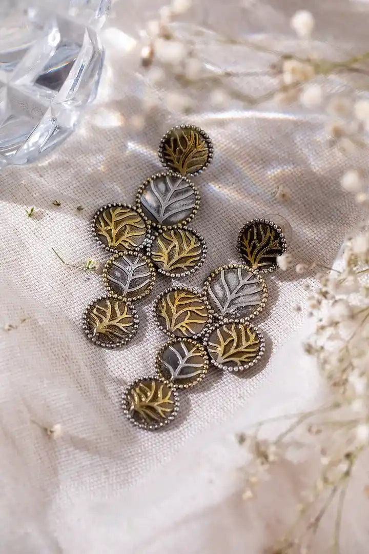 Full set display of Two Tone Gold and Silver Leaf Dangle Drop Earrings with multiple angles.